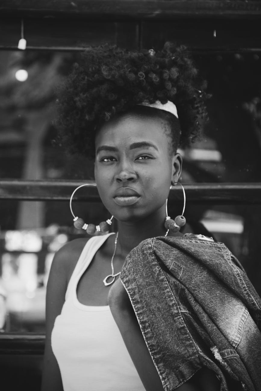 stylish young black woman looking at camera